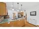 Spacious open kitchen with granite countertops and stainless steel appliances at 1818 Misty Hollow Ln, Apex, NC 27502