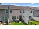 Fenced backyard showing green lawn, patio, and privacy fences at 1891 Frost Dr, Haw River, NC 27258