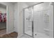 Modern bathroom with a glass-enclosed shower and convenient access to the closet at 1891 Frost Dr, Haw River, NC 27258