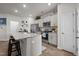 Bright kitchen with stainless appliances, granite counters and a breakfast bar at 1891 Frost Dr, Haw River, NC 27258