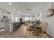Open-concept living room seamlessly connects to the dining area and modern kitchen at 1891 Frost Dr, Haw River, NC 27258