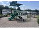 Community playground with slide, climbing structures, and safety mulch for enjoyment at 1891 Frost Dr, Haw River, NC 27258