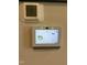 Honeywell thermostat showing the inside humidity and temperature of the home at 1891 Frost Dr, Haw River, NC 27258