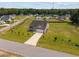 Aerial view of a home in a community with a long driveway and landscaping at 19 Linda Lou Ln # 19, Angier, NC 27501