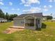 The backyard features a covered porch, wooden deck, and spacious lawn at 19 Linda Lou Ln # 19, Angier, NC 27501