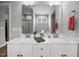 Bathroom featuring double sinks with modern fixtures and cabinetry at 19 Linda Lou Ln # 19, Angier, NC 27501