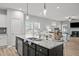 Kitchen island with sink and view of living area at 19 Linda Lou Ln # 19, Angier, NC 27501