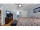 Bedroom featuring hardwood floors, neutral paint, and an ensuite bathroom at 1926 Downing Dr, Burlington, NC 27215
