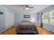 Comfortable bedroom with natural light, ceiling fan and spacious closet at 1926 Downing Dr, Burlington, NC 27215