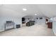 Large bonus room with a leather sectional, kitchenette, and recessed lighting at 1926 Downing Dr, Burlington, NC 27215
