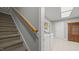 Spacious laundry room featuring modern appliances and ample storage space, conveniently located near the stairs at 1926 Downing Dr, Burlington, NC 27215