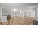 Spacious living area with an open floor plan, hardwood floors, and recessed lighting throughout the space at 1926 Downing Dr, Burlington, NC 27215
