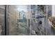 Modern walk-in shower with unique tile and sleek fixtures at 1926 Downing Dr, Burlington, NC 27215