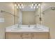 Bright bathroom features a double sink vanity with modern fixtures and plenty of counter space at 1968 Shadow Glen Dr, Raleigh, NC 27604