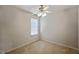 Cozy bedroom featuring neutral carpet, a ceiling fan, and bright, natural light at 2000 Silky Dogwood Trail Trl, Apex, NC 27502