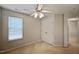 Bedroom with carpet, closet, and a window providing natural light at 2000 Silky Dogwood Trail Trl, Apex, NC 27502