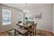 Tastefully decorated dining room featuring a modern chandelier, stylish art, and comfortable seating at 2000 Silky Dogwood Trail Trl, Apex, NC 27502