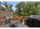 Entertain on the spacious deck with a grill and seating area, ideal for enjoying outdoor gatherings at 2006 Leo Dr, Apex, NC 27502