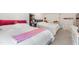 Bright bedroom with comfortable beds, playful decor, and ample space, creating a welcoming atmosphere at 2006 Leo Dr, Apex, NC 27502