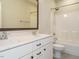 Full bathroom featuring double sink vanity and tiled shower/tub at 2013 Woodbluff Dr, Wendell, NC 27591