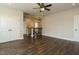 Large bonus room featuring wood floors, lighting fixtures and access to the upstairs hallway at 2013 Woodbluff Dr, Wendell, NC 27591