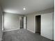 Neutral bedroom with carpet and a closet with sliding doors at 205 Bog Hill Ln, Cary, NC 27519