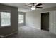 Bright bedroom with neutral walls, carpet, and two windows allowing natural light at 205 Bog Hill Ln, Cary, NC 27519
