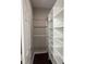Walk-in closet featuring shelving for optimal storage and organization at 205 Bog Hill Ln, Cary, NC 27519