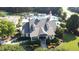 Upper-level view of clubhouse exterior; landscaped walkway to front entrance at 205 Bog Hill Ln, Cary, NC 27519