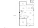 An architectural blueprint of the first floor layout featuring kitchen, dining, laundry, living room, and garage at 205 Bog Hill Ln, Cary, NC 27519
