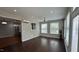 Sunroom with hardwood floors, light gray paint and large windows providing natural light at 205 Bog Hill Ln, Cary, NC 27519