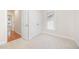 Neutral bedroom featuring plush carpet, a double closet, and a bright window with natural light at 209 Homegate Cir, Apex, NC 27502