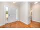 Bright foyer with hardwood floors and access to the rest of the home at 209 Homegate Cir, Apex, NC 27502