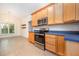 Spacious kitchen featuring stainless steel appliances and stylish countertops at 209 Homegate Cir, Apex, NC 27502