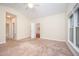 Spacious main bedroom with large windows and ceiling fan at 209 Homegate Cir, Apex, NC 27502