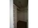 Walk-in closet features built-in shelving and ample storage space at 2100 Breeze Rd, Raleigh, NC 27608