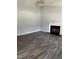 Well-lit living room featuring a fireplace at 2116 Tanglewood Rd, Rocky Mount, NC 27804
