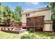 A fire pit and full seating are located near the home's elevated and covered back deck at 212 Heidinger Dr, Cary, NC 27511