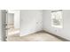A well-lit bedroom with carpet and windows, offering a bright and airy space at 212 Heidinger Dr, Cary, NC 27511