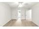 Large bedroom with neutral carpet features ample closet space and neutral paint at 212 Heidinger Dr, Cary, NC 27511