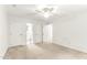 Large bedroom with neutral carpet boasts multiple closets and plenty of room to unwind at 212 Heidinger Dr, Cary, NC 27511