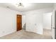 Spacious bedroom with multiple entryways, carpet flooring and modern lighting at 212 Heidinger Dr, Cary, NC 27511