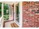 Inviting entryway with brick accents and a 'Welcome' mat at 212 Heidinger Dr, Cary, NC 27511