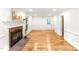 Spacious living room with hardwood floors, fireplace, and natural light at 212 Heidinger Dr, Cary, NC 27511