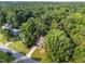 Stunning aerial view of a home, surrounded by green trees and neighborhood at 2205 Bufflehead Rd, Raleigh, NC 27616