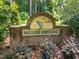 Mallard Crossing community sign featuring a duck and lush greenery at 2205 Bufflehead Rd, Raleigh, NC 27616