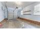 Spacious garage with shelving for extra storage space at 2205 Bufflehead Rd, Raleigh, NC 27616