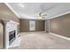 Bright living room with a marble fireplace and access to other rooms at 2205 Bufflehead Rd, Raleigh, NC 27616