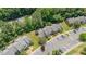 A beautiful community showcasing lush greenery, ample parking, and well-maintained townhomes at 2213 Alpine Rd, Durham, NC 27707