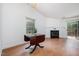 Elegant dining room with hardwood floors, chandelier, and bright natural light at 2213 Alpine Rd, Durham, NC 27707